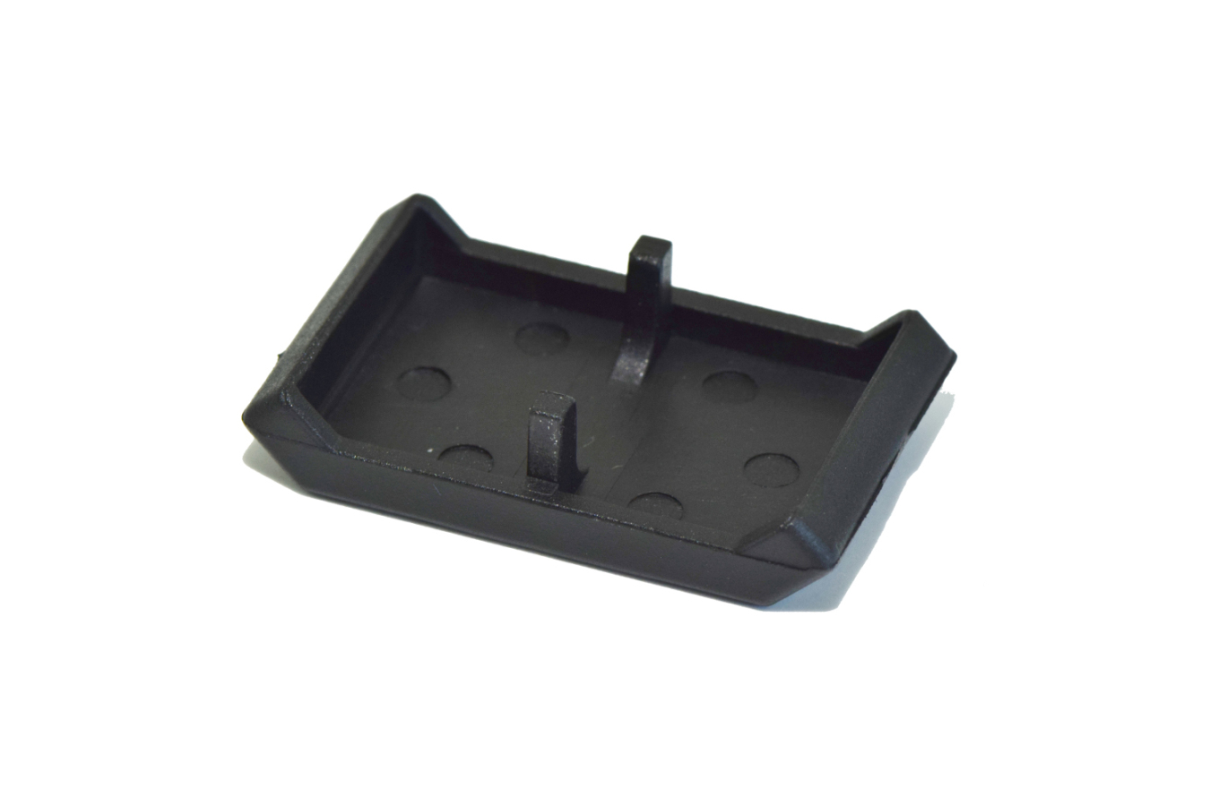 Abdeckkappe aus Nylon für leichte Winkel, als Abschluss und Schutz für Aluminiumprofil-Konstruktionen (System Item/Bosch)	 Schwarze Nylon-Abdeckkappe für leichte Winkelprofile, Rückansicht
